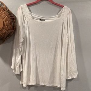 Iman off the shoulder top